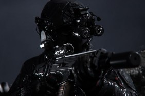 Modern Warfare 3: a soldier at night wearing goggles and pointing a gun off-screen.