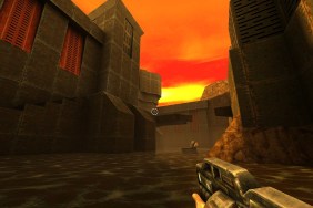 Quake 2: a sun setting behind some brutalist buildings.