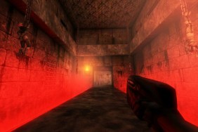 Unreal (1998): A dark corridor with a very red misty haze.